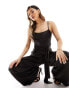 Фото #2 товара Flounce London cowl neck tie side satin jumpsuit in black