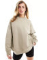 The Couture Club washed emblem sweatshirt in beige