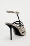 Animal print strappy high-heel shoes