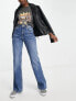 Фото #1 товара Topshop relaxed flare jeans in mid blue