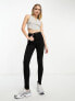 ASOS DESIGN Tall skinny jeans in mid blue