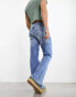 Фото #2 товара ASOS DESIGN vintage flare jeans in mid blue wash