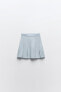 Box pleat knit mini skirt