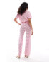 The Frolic hibiscus crochet wide leg beach trouser co-ord in bubblegum pink