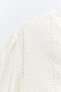 Blouse with cutwork embroidery