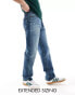 Фото #6 товара ASOS DESIGN straight leg jeans with stretch in mid wash blue