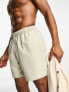 ASOS DESIGN swim shorts in mid length in ecru