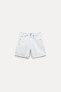 Trf mid-rise denim bermuda shorts