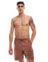 ASOS DESIGN swim shorts in mid length with cargo pocket detail in brown