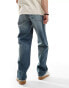 ASOS DESIGN baggy jeans in mid wash with abrasions