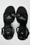 Sandals with knotted straps