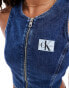 Фото #2 товара Calvin Klein Jeans zip crop denim top in dark wash