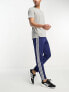 Фото #4 товара adidas Training Train Essentials 3 stripe joggers in navy