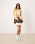 Фото #2 товара ASOS DESIGN crew neck cardigan in open stitch with bow detail in yellow