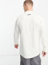 Nike – Trend – T-Shirt in Cremeweiß mit Stehkragen