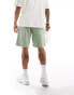 New Era washed jersey shorts in green