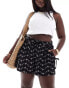 Фото #1 товара ASOS DESIGN Curve broderie shorts with tie pockets in black/white