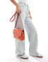 Accessorize crossbody bag in orange