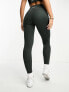 New Balance Linear Heritage high waisted leggings in washed black