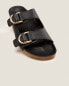 Flat leather sandals with buckles