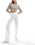 Bershka crinkle flared beach trousers in white