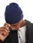 ASOS DESIGN fisherman ribbed beanie in navy