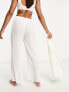 The Frolic tourmaline shirred wide long trouser co-ord in white pleated texture