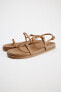 FLAT STRAPPY SLIDER SANDALS