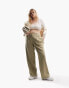 Фото #1 товара ASOS DESIGN Curve everyday slouchy boy trousers in washed olive