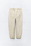 Carrot fit trousers with elasticated back
