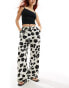 Vero Moda Aware wide leg trousers in monochrome floral print