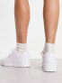 Truffle Collection chunky flatform trainers in white