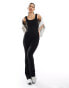 Фото #2 товара In The Style ribbed scoop neck flared jumpsuit in black