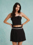 Фото #1 товара Miss Selfridge pleated mini skirt with bow detail co ord in black