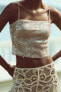 Sequinned crochet skirt