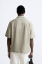 Фото #3 товара Рубашка из рельефной ткани с карманами ZARA