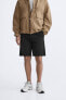 TEXTURED CHINO BERMUDA SHORTS