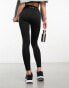 Фото #4 товара Ellesse Pennie leggings in black