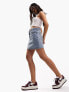 ASOS DESIGN Petite denim high waist mini skirt in midwash blue