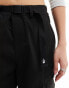 The North Face Tonegawa loose cargo belted trousers in black