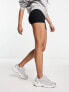Фото #4 товара Шорты спортивные ASOS DESIGN - Короткие леггинсы-шорты в черном