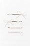 Pack of faux pearl bead bow hair clips