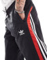 Фото #2 товара adidas Originals Street track pants in black and red