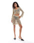 Фото #1 товара ASOS DESIGN knitted mini skirt in metallic yarn with crochet floral embellishment co-ord