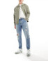 Фото #5 товара ASOS DESIGN tapered fit jeans with rips in light wash blue - MBLUE