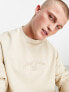 ASOS DESIGN oversized sweatshirt in beige with central embroidery