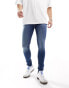 ASOS DESIGN spray on jeans with power-stretch in mid wash blue