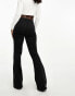 ASOS DESIGN Hourglass sculpting super stretch flare jeans in black