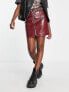 Фото #4 товара ASOS DESIGN cracked faux leather western mini skirt in burgundy