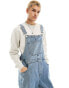 ASOS DESIGN denim dungarees in mid wash blue